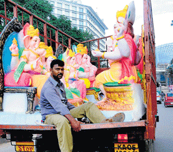 An idol of Lord Ganesha is transported in a mini lorry on the eve of the  Gowri-Ganesha festival on BH Road in the City on Monday. dh photo