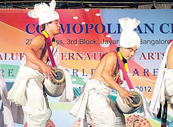 intriguing Dancers from Manipur performing Pung Cholam.