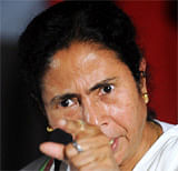 The chief Minister of the eastern Indian state of West Bengal and the leader of the political party Trinamool Congress (TMC), Mamta Banerjee, gestures as she address a press conference after her party's meeting in Kolkata on September 18, 2012. Banerjee, a key partner in India's ruling coalition withdrew support from the government and said its ministers would resign in protest over a series of economic reforms. AFP PHOTO