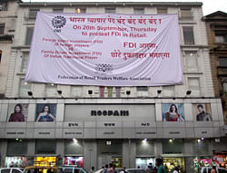 A huge poster with a message announcing the 'Bharat Bandh' scheduled on 20th September to oppose the Foriegn Direct Investment (FDI) put up by an association of local retail traders in Mumbai on Tuesday. PTI
