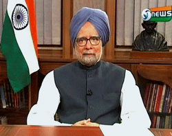Prime Minister Manmohan Singh addressing the nation in New Delhi on Friday. PTI Photo / TV GRAB