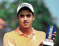 STELLAR SHOW: Khalin Joshi with the trophy after winning the Southern India Amateur golf championship. DH PHOTO