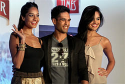: Business tycoon Siddharth Mallya with model and actress Lisa Haydon (L) and Nathalia Pinheiro duirng the launch of 'Hunt for the Kingfisher Calender Girl' in Mumbai on Friday. PTI