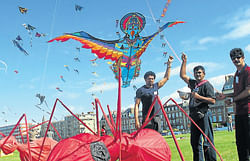 FLY HIGH: Team Mangalore members proudly fly their kite over France skies.