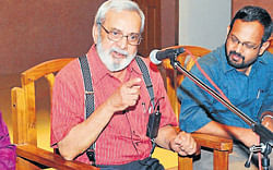 Jnanapeeth awardee Dr U R Ananthamurthy addressing a gathering at an interaction programme with government servants in Manipal on Saturday. DC Dr M T Reju and ZP&#8200;CEO&#8200;Prabhakar Sharma look on.  dh photo
