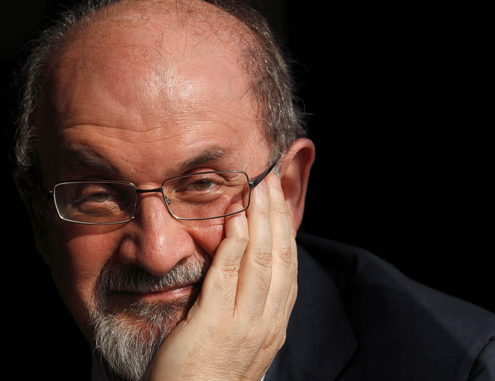 Author Salman Rushdie poses for a photograph after an interview with Reuters in central London, in this October 8, 2010, file photo. Rushdie's memoir of more than nine years in hiding after Iran's supreme leader issued a death sentence against him hits the shelves on September 18, 2012, ending the wait for his account of a furore that has echoes across the world today. REUTERS