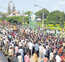 Gigantic: Ganesh idols being taken out in a procession, for mass immersion, in Mysore on Sunday. DH photo