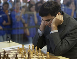 Chess player Viswanathan Anand of India competes during Chess Grand Slam Final Masters chess game against Francisco Vallejo of Spain inside a case of glass at the Ibirapuera Park in Sao Paulo, Brazil, Monday, Sept. 24, 2012. AP