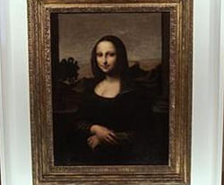 A painting attributed to Leonardo da Vinci and representing Mona Lisa is pictured during a preview presentation in a vault in Geneva September 26, 2012.  Reuters