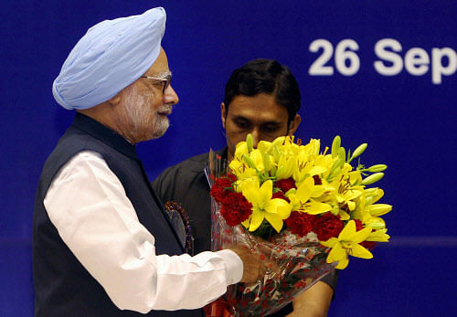 Prime Minister Manmohan Singh is greeted at the 70th Foundation Day function of Council of Scientific & Industrial Research (CSIR) at Vigyan Bhawan in New Delhi on Wednesday. PTI Photo