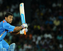 Indian cricketer Mahendra Singh Dhoni plays a shot during the ICC Twenty20 Cricket World Cup's Super Eight match between India and Australia at the R. Premadasa Stadium in Colombo on September 28, 2012. AFP
