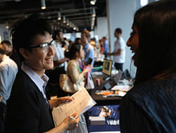 Job applicants meet potential employers at the NYC Startup Job Fair held at 7 World Trade Center. AFP file photo