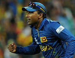 Sri Lankan captain Mahela Jayawardene celebrates his team's victory during the ICC Twenty20 Cricket World Cup's semi-final match between Sri Lanka and Pakistan at the R. Premadasa International Cricket Stadium in Colombo on October 4, 2012. Sri Lanka, restricted to 139-4 after electing to bat, hit back to keep Pakistan down to 123-7 in a thrilling semi-final before 35,000 fans at the Premadasa stadium. AFP