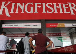 Travellers make inquiries at the Kingfisher Airlines booking counter at the airport after their flight was cancelled in Mumbai on October 1, 2012. India's cash-strapped Kingfisher Airlines cancelled several flights due to staff unrest, it said, fuelling more doubts about the private carrier's future and sending its shares plunging. AFP
