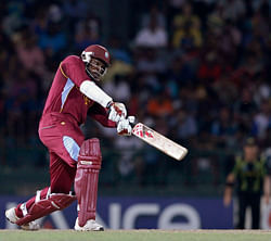 West Indies Chris Gayle plays a shot during their Twenty20 World Cup semi-final cricket match against Australia in Colombo October 5, 2012. REUTERS/Dinuka Liyanawatte