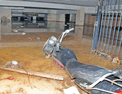 The basement of an apartment in the area is clogged with rainwater. DH Photos