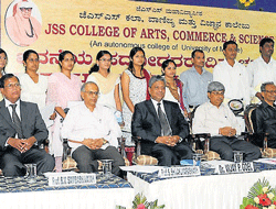 achievers: Toppers in degree courses along with dignitaries at the fifth graduates day at JSS College of Arts, Commerce and Science in Mysore on Saturday. Principal B V Sambashivaiah, deputy secretary-II S Shivakumaraswamy, deputy director general of Union higher education department Vijay P Goel, deputy secretary S P Manjunath, director of education, JSS&#8200;MVP, T D Subbanna and S&#8200;Kumar are seen. DH Photo