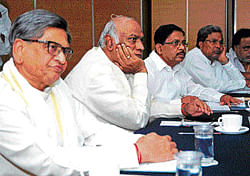 TALKS: External Affairs Minister S M Krishna, Labour Minister Mallikarjun Kharge,  Karnataka Pradesh Congress Committee president G Parameshwara, Leader of the Opposition in Assembly Siddaramaiah and actor Ambareesh interact with experts on  the Cauvery issue in Bangalore on Saturday. DH Photo