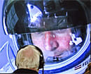 Pilot Felix Baumgartner of Austria is seen on a screen at mission control center in the capsule during the final manned flight for Red Bull Stratos in Roswell, New Mexico, in this October 14, 2012 handout photo.  Reuters Photo