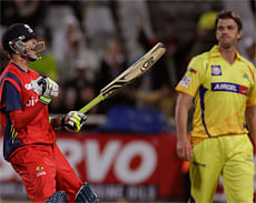 Highveld Lions Chris Morris, left, reacts as his team wins the game against the Chennai Super Kings, during a Champions League Twenty20 in Cape Town, South Africa, Tuesday, Oct 16, 2012. (AP Photo)