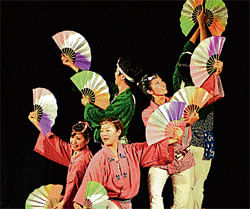 traditional Japanese dancers perform the Sparrow dance.