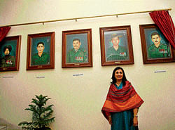 PROUD MOMENT Aarti Zaveri with her paintings of war heroes.  Pic COURTESY AARTI ZAVERI.