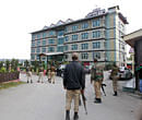 Policemen arrive at the scene of a shooting incident outside Hotel Silver Star in the outskirts of Srinagar October 19, 2012. Reuters