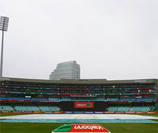 View of the stadium during rainfalls before the Champions League T20 match between the Delhi Daredevils of India and the Auckland Aces of New Zealand at Sahara Park Kingsmead on October 19, 2012 in Durban. AFP PHOTO