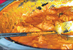 Tempting: Chingri macher malai curry.