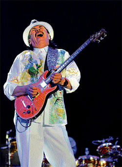 soulful: Grammy award winner Carlos Santana performs at Bhartiya City on Friday. DH Photo