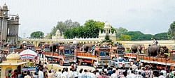 Goodbye: Dasara elephants loaded on to lorries head back to the forest from Amba Vilasa Palace premises in Mysore on Friday. dh photo