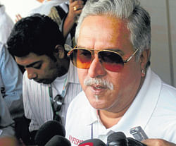 Vijay Mallya talks to the media during the Indian F1 Grand Prix at the Buddh International Circuit in Greater Noida, on the outskirts of New Delhi, on Saturday. REUTERS