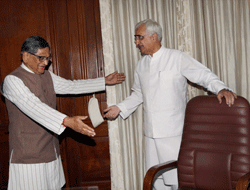 Salman Khurshid takes charge as External Affairs Minister from his predecessor SM Krishna in New Delhi on Sunday. PTI