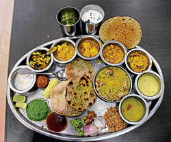 fulfilling: A thali at Rajdhani restaurant is a mix of Rajasthani and Gujarati cuisines.