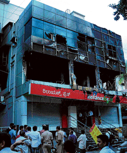 tragedy averted: The two-storey building that was gutted in a fire mishap at Indiranagar  on Friday. DH Photo