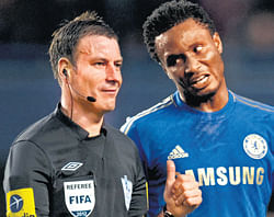 shamfeul act Mark Clattenburg (left) was accused of using inappropriate language against Nigerian John Obi Mikel during Chelseas match against&#8200;Manchester United last week. AFP