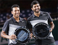 India's Bhupathi and Bopanna celebrate after winning their men's doubles final match against Qureshi of Pakistan and Rojer of the Netherlands at the Paris Masters tennis tournament in Paris. Reuters