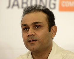 Virender Sehwag speaks during the unveiling of the VS319 collection during a function in New Delhi on November 6, 2012. The collection was inspired by the record breaking score by Virender Sehwag of 319 runs in a cricket Test match. AFP