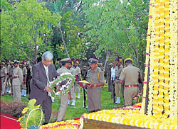 Principal district and sessions court judge Mohan&#8200;Sripada Sankolli lays wreath on Forest Martyrs memorial in Mysore on&#8200;Saturday. dh photo