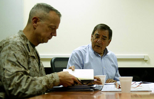 (FILES) In this photograph taken on June 7, 2011, US Secretary of Defence Leon Panetta (R) speaks with Commander of International Security Assistance Force (ISAF) General John Allen (L) during a meeting in Kabul. The US commander in Afghanistan, General John Allen, is under investigation for 'inappropriate' emails to a woman linked to the sex scandal involving former CIA director David Petraeus, a defense official said November 13, 2012. The revelation represented yet another stunning turn in a widening scandal that has jolted Washington only days after the re-election of President Barack Obama, with lawmakers vowing to get to the bottom of case. AFP