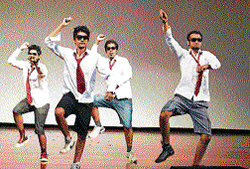 catchy moves Students shake a leg to Gangnam Style.