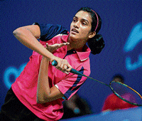 valiant effort Indias PV Sindhu returns during her opening-round loss to Eriko Hirose of Japan in the China Open badminton tournament on Wednesday. afp