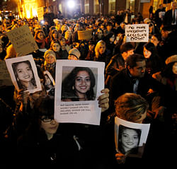Protestors outside Leinster House in Dublin Wednesday Nov. 14, 2012 against the death in October of Savita Halappanavar, pictured, a dentist aged 31, who was 17 weeks pregnant, after suffering a miscarriage and septicaemia. The woman's husband Praveen Halappanavar claims she had complained of being in agonising pain while in Galway University Hospital. He has said that doctors refused to carry out a medical termination because the foetus's heartbeat was present. Ireland's constitution officially bans abortion, but a 1992 Supreme Court ruling found the procedure should be legalized for situations when the woman's life is at risk from continuing the pregnancy. (AP Photo
