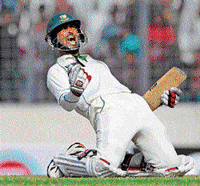 ECSTATIC Naeem Islam exults after scoring a century. AP