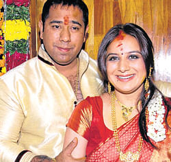 All smiles: Anand Gowda and Pooja Gandhi