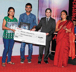 winners all Vivek and Madhuri receiving their awards.