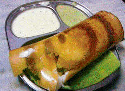 crispy Masala dosa with coconut chutney.