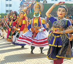 Cultural troupes perform during the procession prior to the inauguration of Alvas Nudisiri at Moodbidri on Friday. DH&#8200;Photos