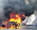 A car in flames at Machlikaman Sharan after an incident of violence in the old city area of  Hyderabad on Friday. PTI