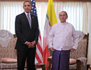 US President Barack Obama (centre L) finishes a meeting with Myanmar's President Thein Sein (centre R) at the regional parliament building in Yangon on November 19, 2012. Obama met Myanmar's reformist leader Thein Sein during a landmark visit to Yangon aimed at encouraging political reforms. AFP PHOTO